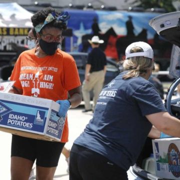 Back to school event serves 200 families; Organization provides food, supplies and cash to those in need