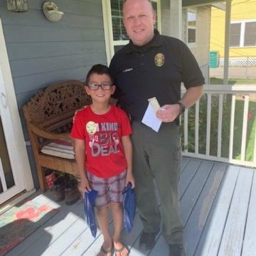 Conroe PD Chief pays visit to young fan