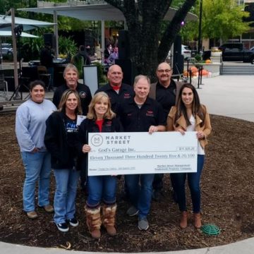 Market Street’s Change for Charity donates over $11,000 to God’s Garage