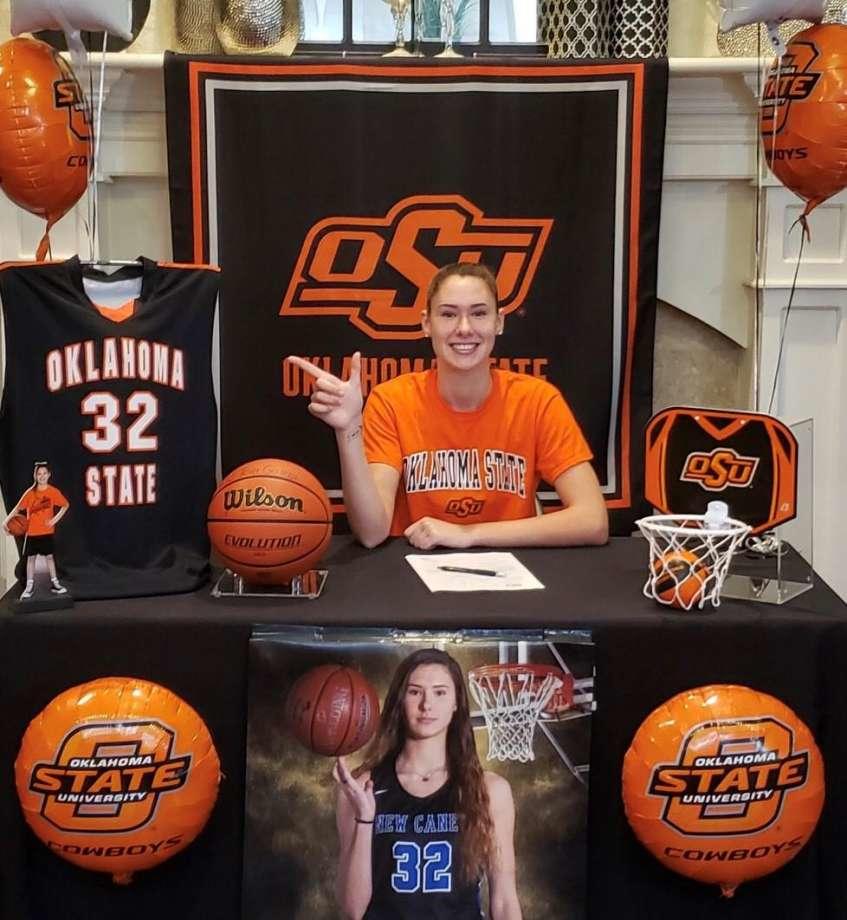 SIGNING DAY New Caney’s Garza makes it official with Oklahoma State