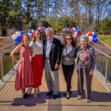 Woodlands Waterway Bridge near East Shore Dedicated as Robert Heineman Pedestrian Bridge