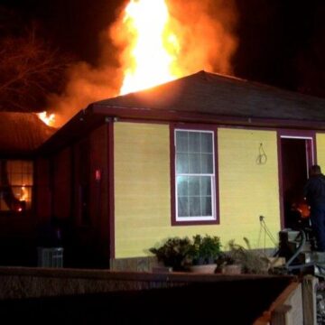 FIREFIGHTERS BATTLE LAKE WILDWOOD HOUSE FIRE