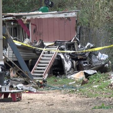 Body discovered in burned travel trailer in Magnolia