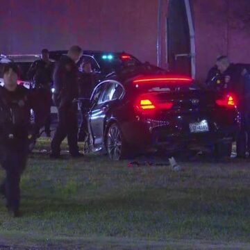 High-speed chase ends with car slamming into utility pole along North Freeway, passenger trapped, HCSO says